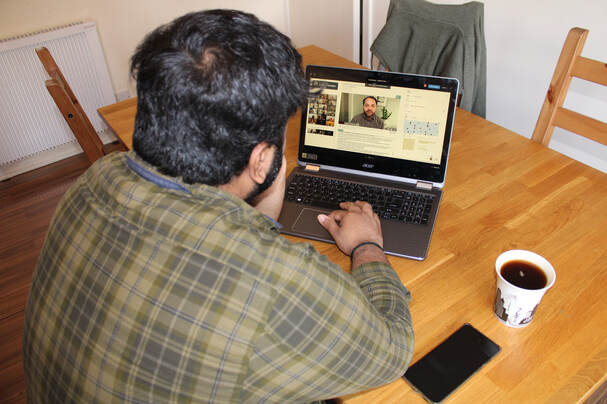 Participant doing an in-person usability test on a high fidelity prototype.